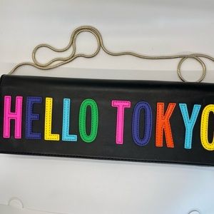 Playful big enough for IPhone, lipstick and ID cards